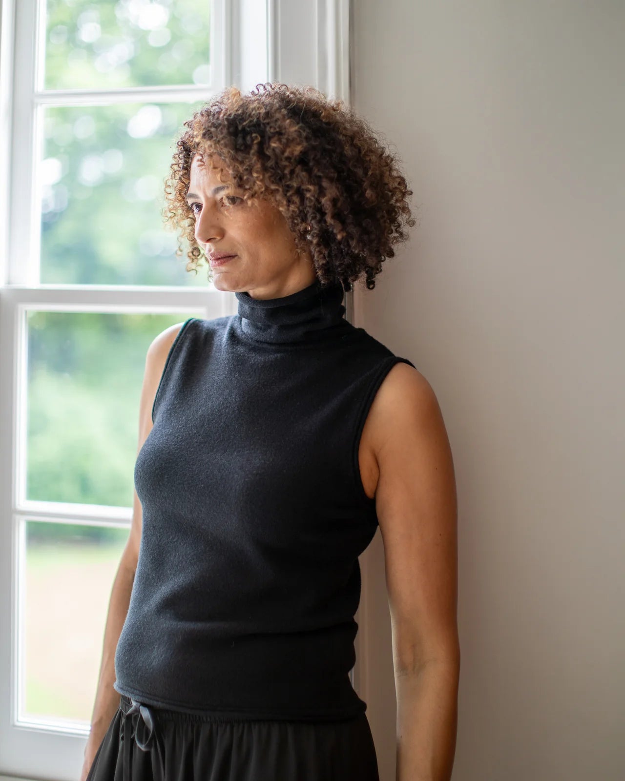 Posy Roll Neck Top in Black by The Nook