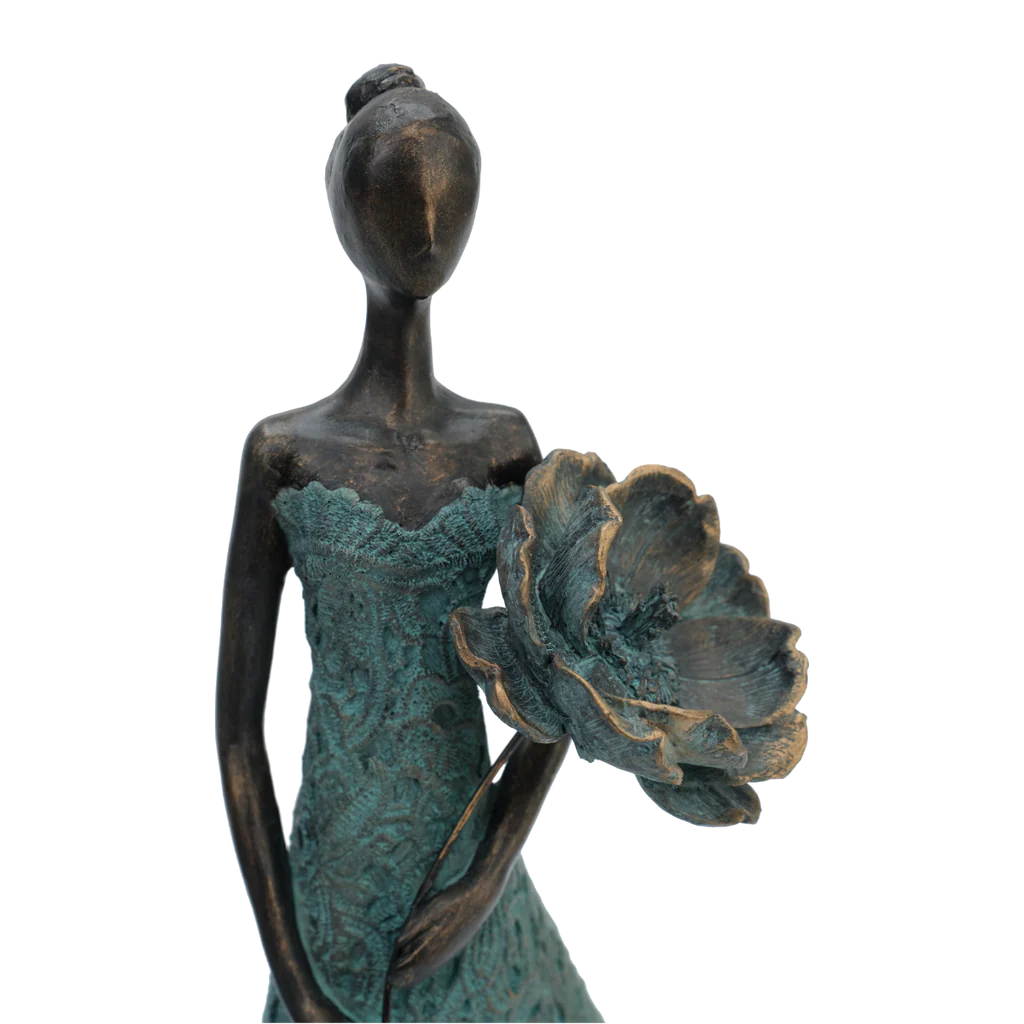 Girl Holding Flower Sculpture by Bentley & Bo Interiors