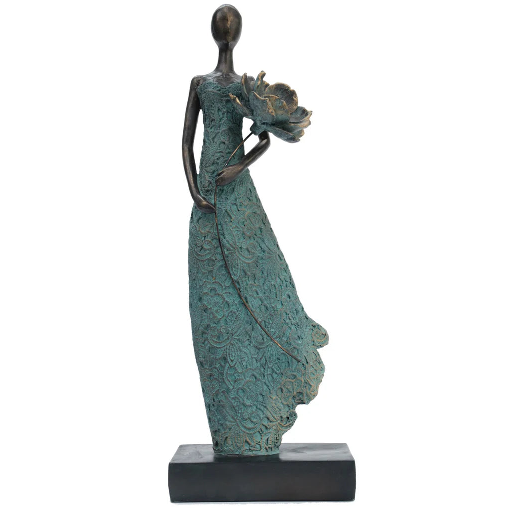 Girl Holding Flower Sculpture by Bentley & Bo Interiors