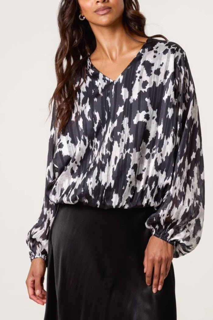 Cow Print V Neck Bubble Hem Blouse by The Nook
